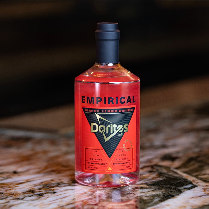 Doritos x Empirical bottle photographed on a marble bar