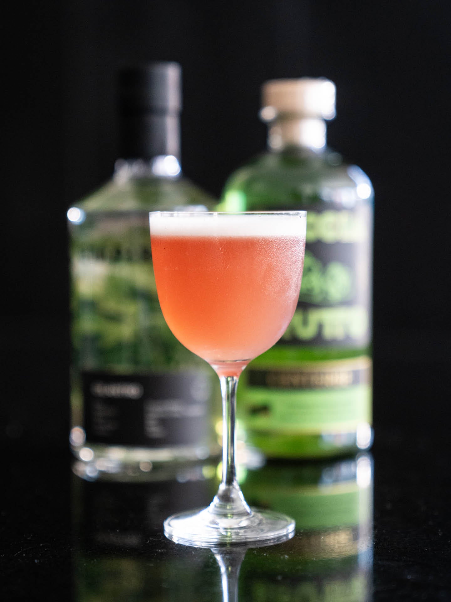 Pink-blush cocktail in a coupe glass — Cilantro & Centerbe pairing
