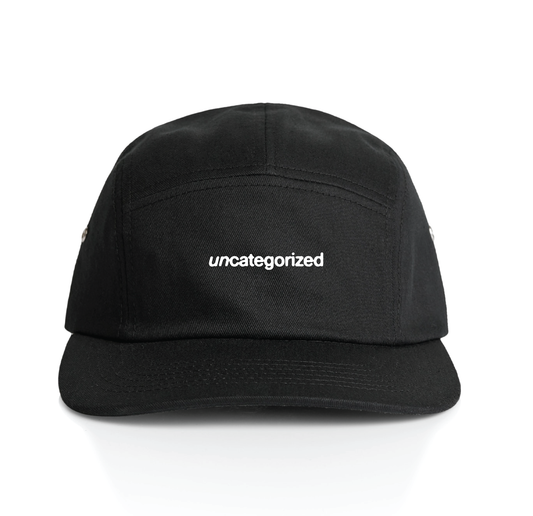 Empirical Uncategorized Cap, front: black 5-panel cap with uncategorized embroidery